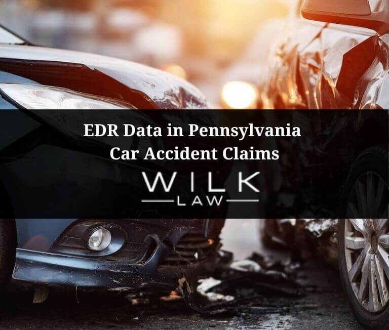 Two cars after an accident in an intersection illustrating EDR data in Pennsylvania car accident claims