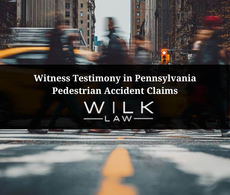 Pedestrians in a crosswalk in heavy traffic in Philadelphia, Pennsylvania