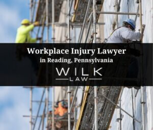 Construction workers working high up on scaffolding in Reading, Pennsylvania related to a workplace injury claim handled by Wilk Law