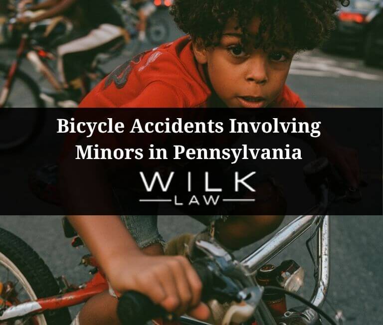 Child on his bike in the road in Philadelphia, Pennsylvania related to a case handled by Wilk Law Personal Injury & Car Accident Lawyers