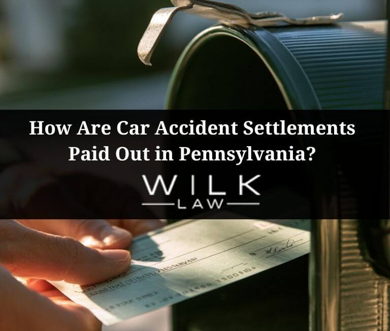 Car accident victim picking up a settlement check in their mailbox in Reading, Pennsylvania