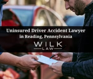Two drivers exchanging information after a car accident in Reading, Pennsylvania