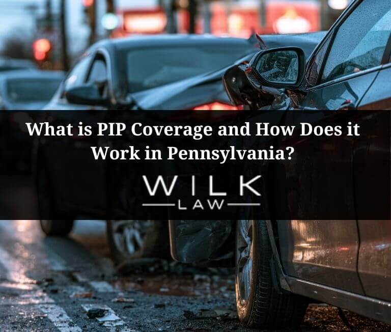 Mild fender bender car accident involving two vehicles in street in front of gas station location in Philadelphia, Pennsylvania