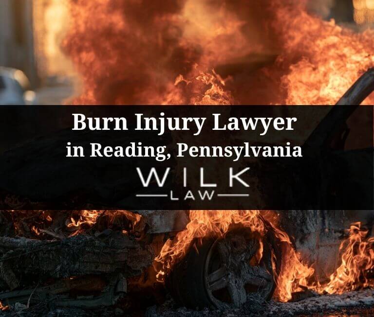 Car on fire after an accident related to a burn injury case handled by Wilk Law Personal Injury & Car Accident Lawyers in Reading, Pennsylvania