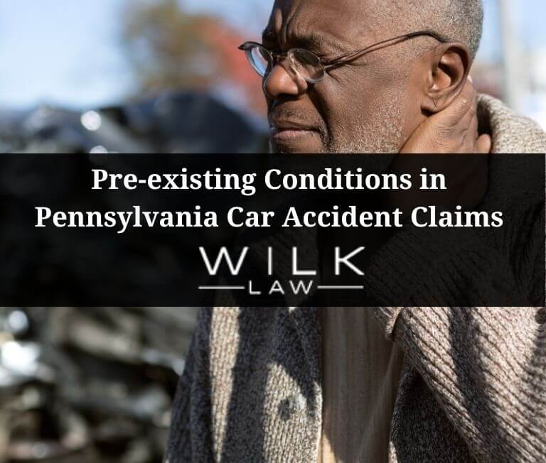 Man with pre-existing condition holding his neck in pain after a car accident in Philadelphia, Pennsylvania